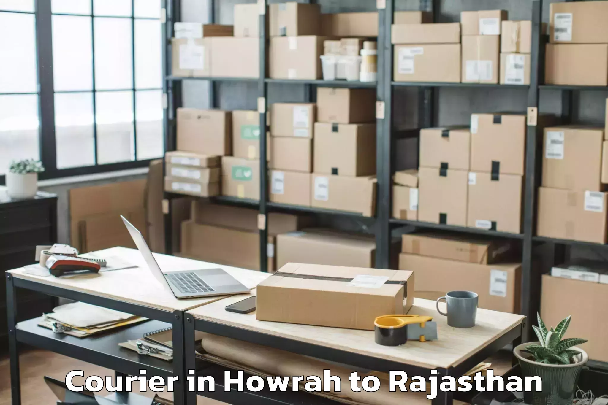 Trusted Howrah to Bamanwas Courier